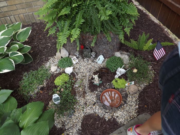 This is a fairy garden that I saw at a garden show. Children love these.