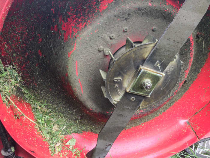 A close up of lawn mower blades.