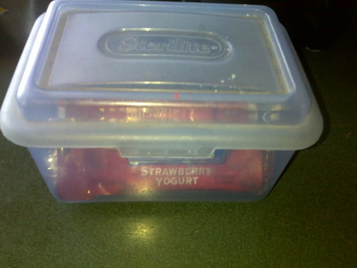 Storing granola bars in a container with a lid is better than storing them in the box from the store.