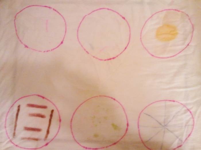 Diaper one was washed in no detergent at all.  Surprisingly, many of the stains were removed. 