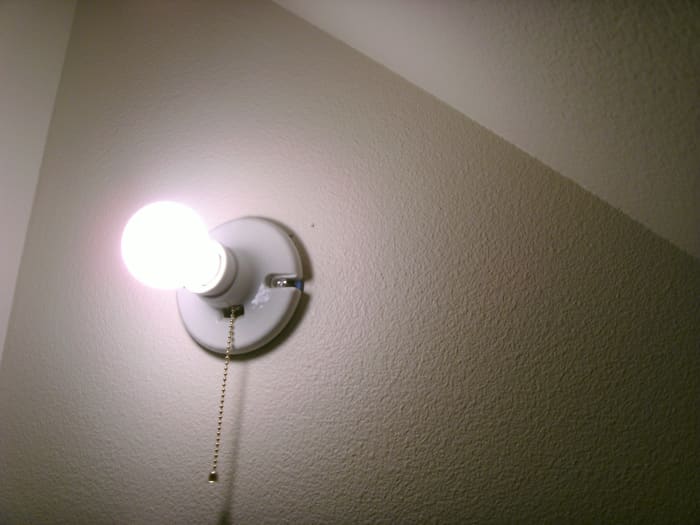 A new outlet was added to this closet wall using an outlet in the living room for power. Wire was then run to a second new box for this light. All-in about 1/2 hour.