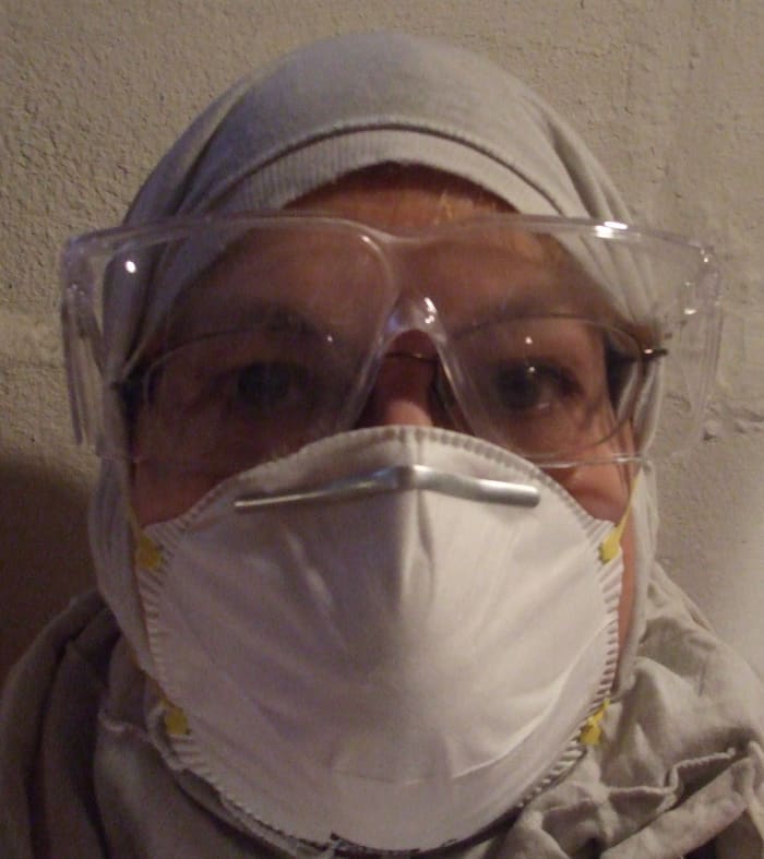 For working above your head on mold cleaning, include a respirator, goggles and a covering for your hair.