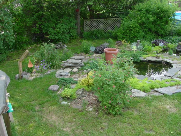 This is my pond with pond liner. Notice the stones piled up, entire landscaping wasn't finished.