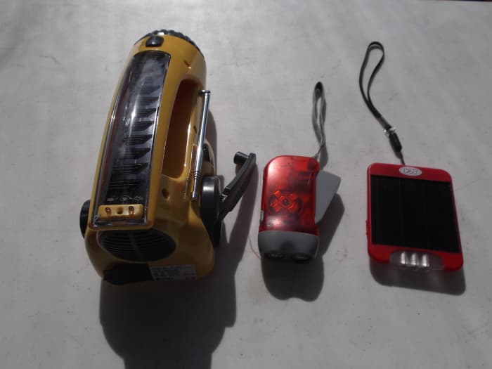 We never buy batteries for flashlights or torches. These are just some of the solar and dynamo flashlights we use around our home.