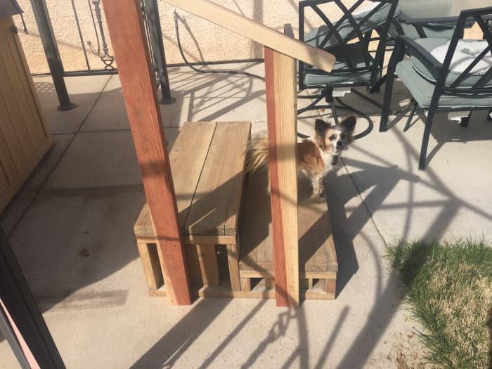 Bella, my Papillon, has inspected and approved the added handrail and pronounced it ready to varnish.