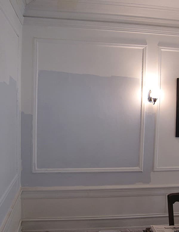 Architectural accents can make a room. This wall features a wainscoting effect and a beautiful blue and white paint combination. This wall has it all!