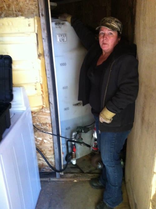 My water cistern is enclosed in an insulated building for heating during cold temperatures through the winter months.