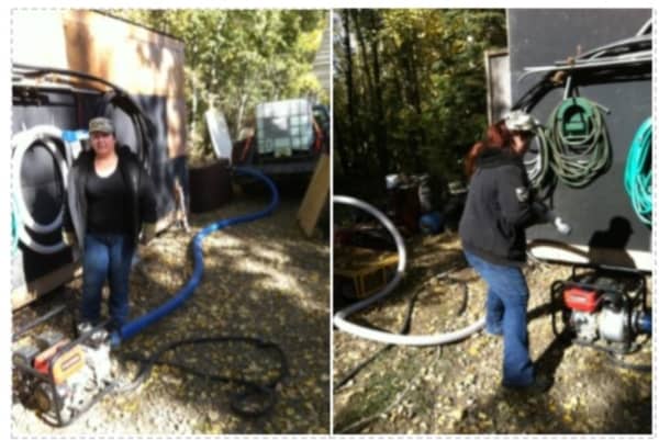 The 3" transfer pump connecting the 250 gallon water tote on the pickup to the cistern inside the building.