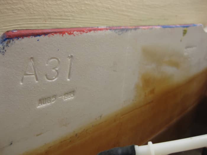 This is the inside tank of a Gerber toilet. The date (Aug 5, 1965) is stamped on the left side; the brand name is stamped on the right.