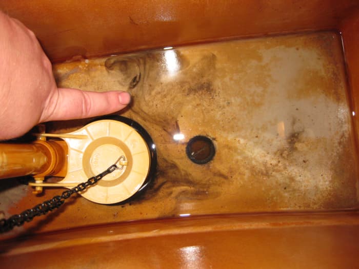 Notice the rusted screw. It is a good idea to apply penetrating oil when removing screws in this condition to prevent cracking the tank.