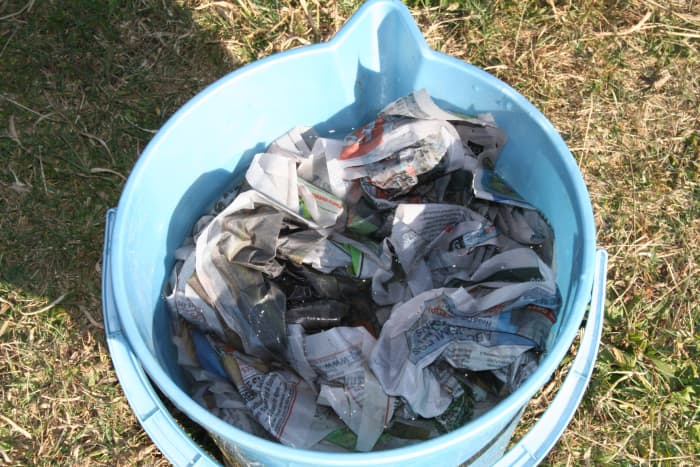 It is a lot faster to fill a bucket with newspaper when you are simply scrunching it instead of shredding it.