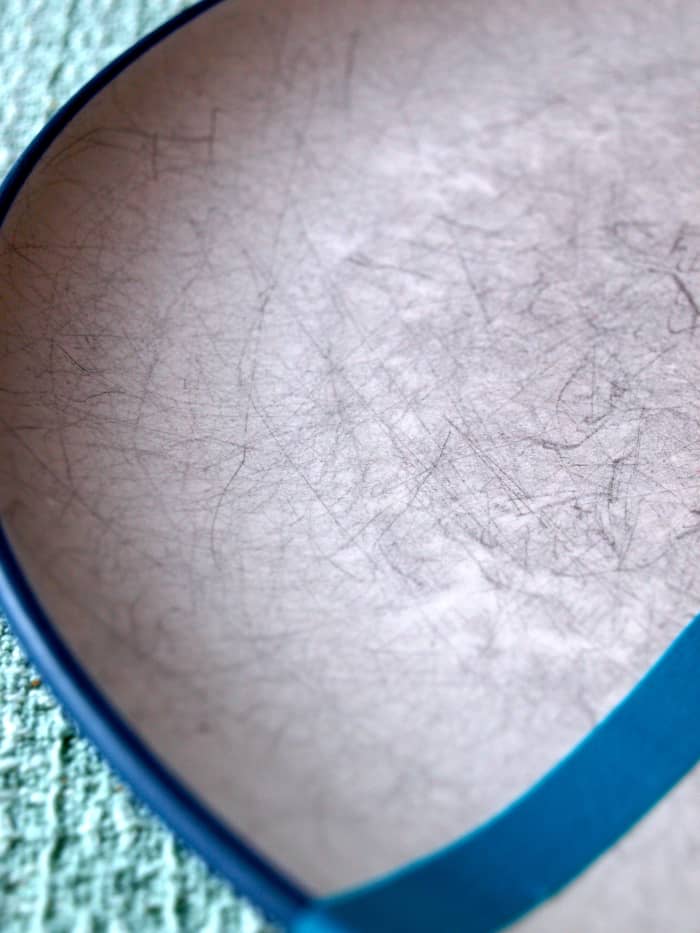 This is what 13 years of scuff marks on a dinner plate looks like. The surface of these dishes used to be ivory!