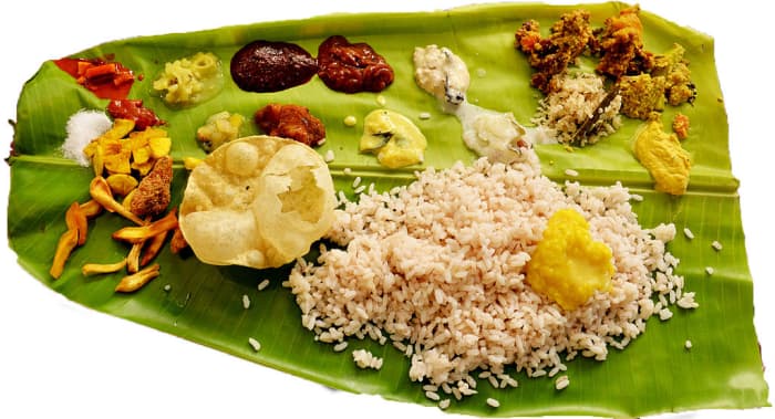 Traditional feast served in banana leaf.