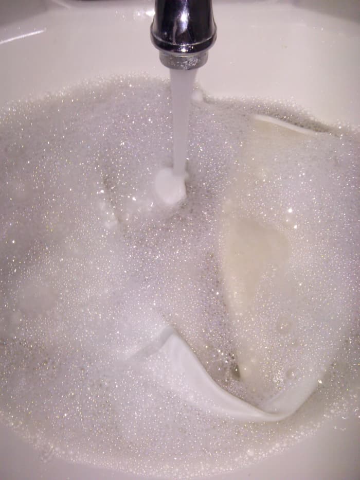 You may notice when your bra becomes wet that the inner liner appears darker. This is not a sign of it being heavily soiled. Most manufacturers use a thin foam like liner inside that is a cream or taupe color.