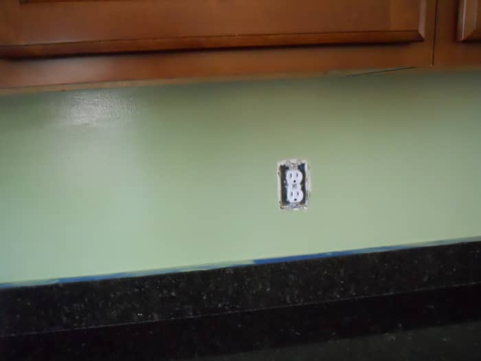 I used an 8-inch roller to paint most of the backsplash. A 1-1/2 inch angled brush was used to fill in where the roller would not reach.