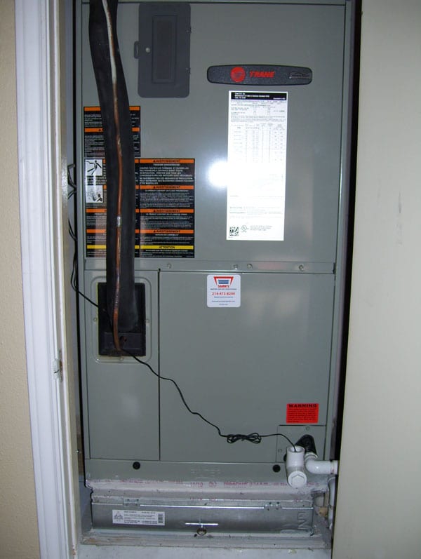 The wire set from the drain system's float switch connects to the furnace's low-voltage control circuit.