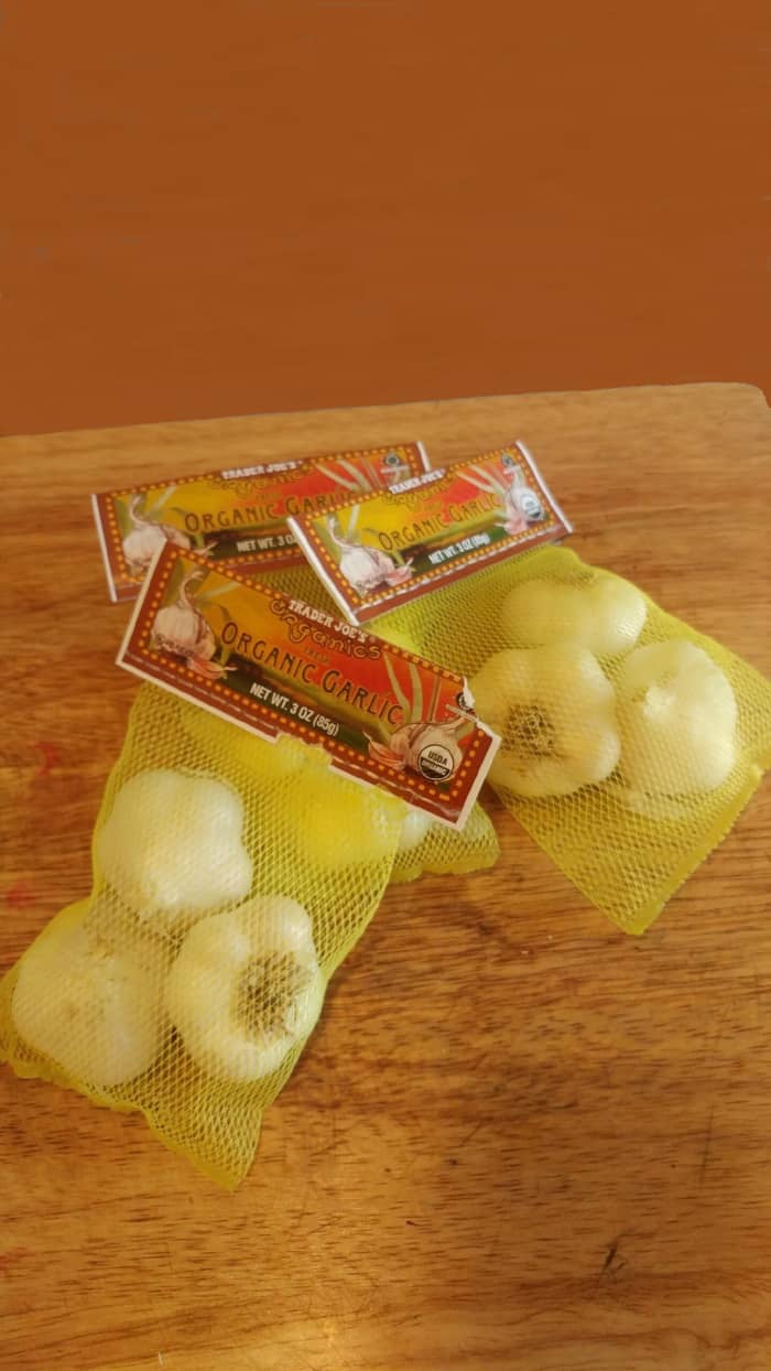 Buy garlic at your local grocery store. A large amount is not needed. Garlic may be planted in a small patch of a garden.