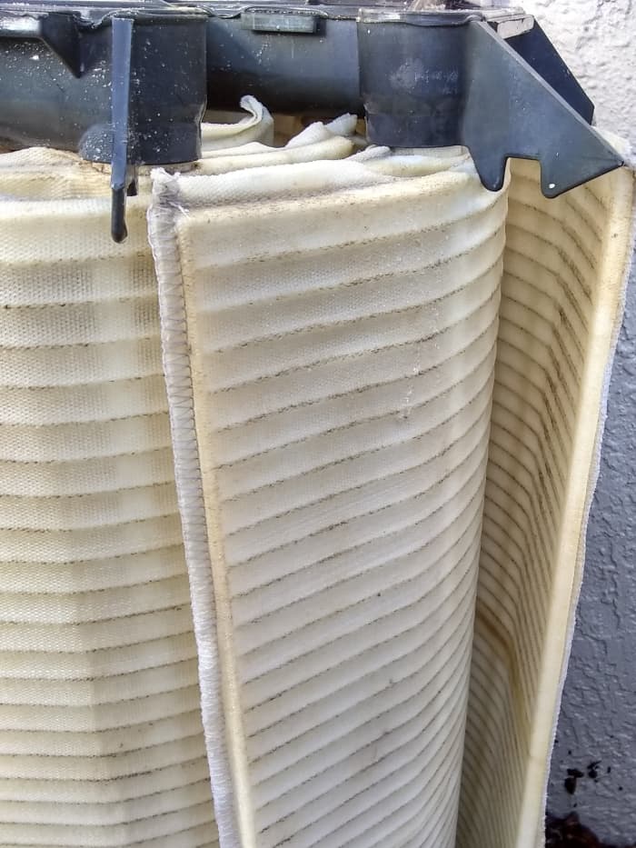 Rinse the entire grid assembly clean. This can take awhile since there is build up in the center as well.