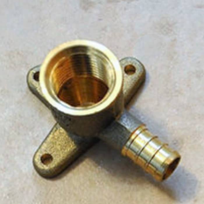 A drop ear elbow. The shower pipe screws into the upper threads while the piping to the valve goes on the lower stem. "Ears" are available to fasten to the wall.