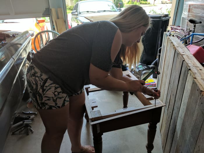 Taking apart the table so I can paint it. You want to take apart as many pieces as possible otherwise the paint job won't turn out as well.