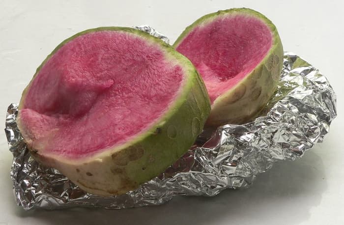 Chinese Daikon Watermelon Radish. It is green on the outside and pink on the inside like a watermelon.