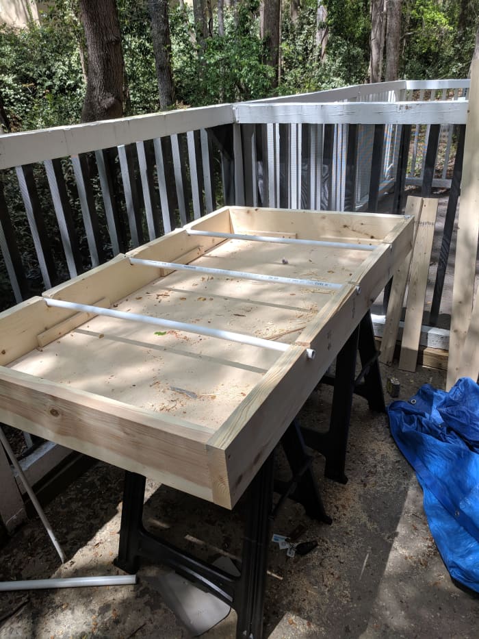 I put together my support slots by doing a U-Shape setting, but this took a while to do, so I actually recommend just using a spade bit that is larger than your pipe and drilling a regular hole instead, and then sliding the pipe through the hole.