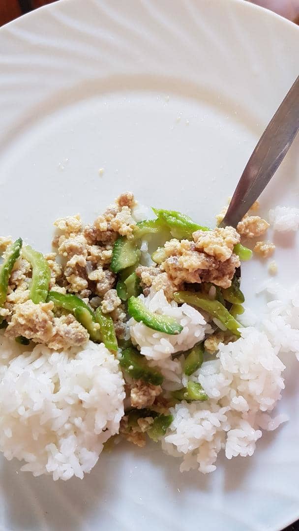 Add the sliced ampalaya (and optional egg if desired), and simmer for a final 10 minutes. Pair the dish with white rice for a delicious lunch!