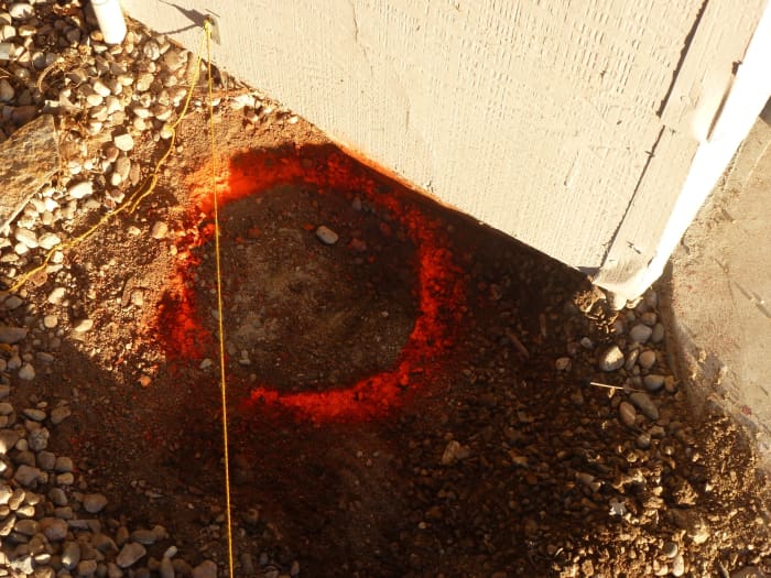 The paint ring left when the template is removed. The hole will be the unpainted center area.