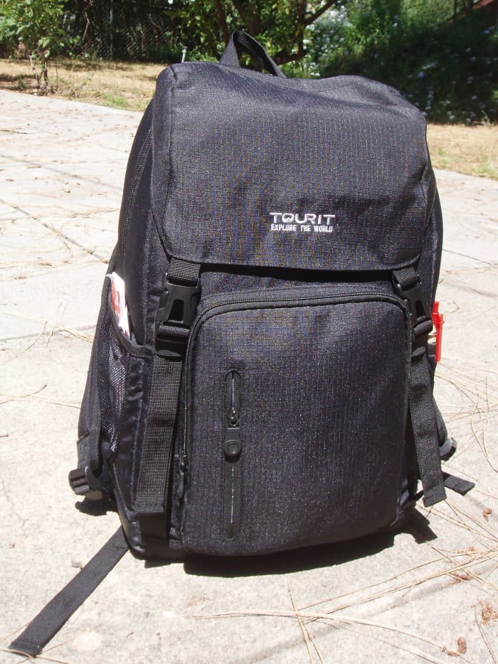 Here's the insulated backpack I use. On Amazon it was called a picnic backpack. It's got very comfortable straps, with a hook on one that I use to hook my keys onto. I think, really, it's a can opener (lol).