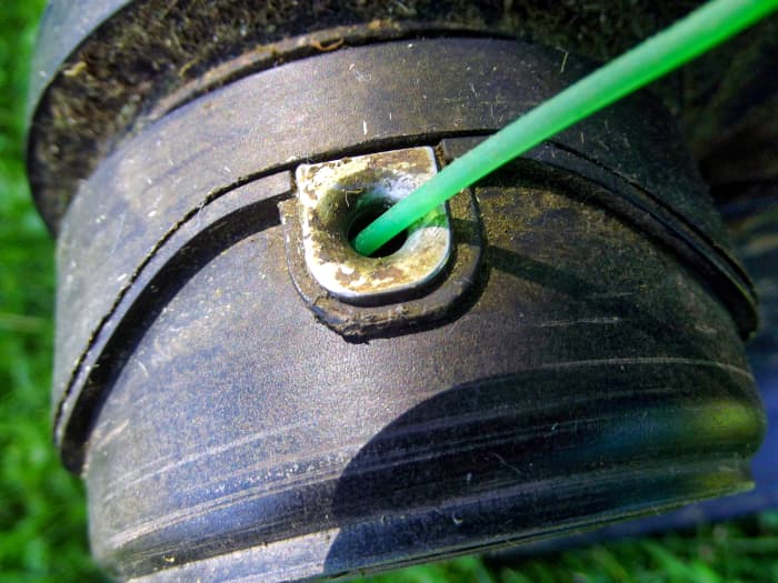 This compartment holds trim line spool used in Black & Decker LST540 Brushless String Trimmer.