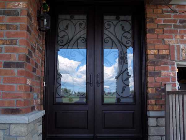 A brand new front door completely changes the front elevation of the house.
