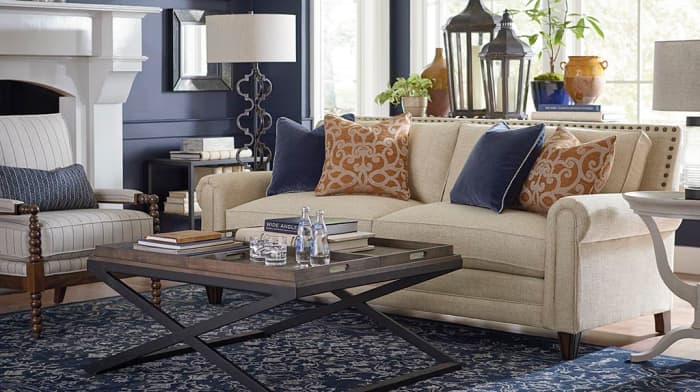 Use just the right amount of pillows so you can sit down without having to move them.
