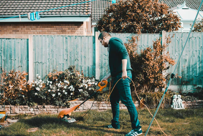 Hurricane preparedness in the yard includes trimming trees, cleaning up any debris, and repairs to broken fences or gutters.