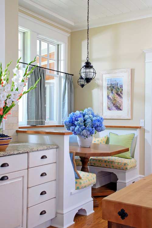 A banquette seating is a cozy spot for a quick breakfast or the Sunday newspaper and a cup of coffee