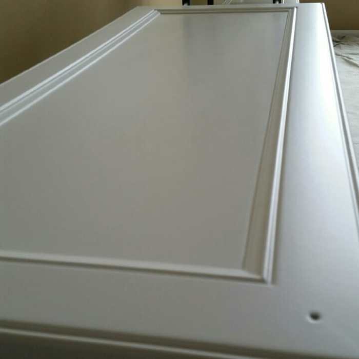 Spraying Doors Vertically vs. Laying Flat Which One's Better