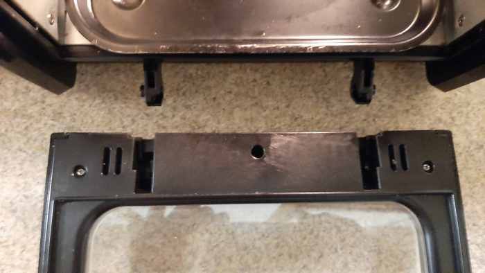 It is very helpful that the door is removable for cleaning purposes. It takes a potentially bad situation and makes it manageable.