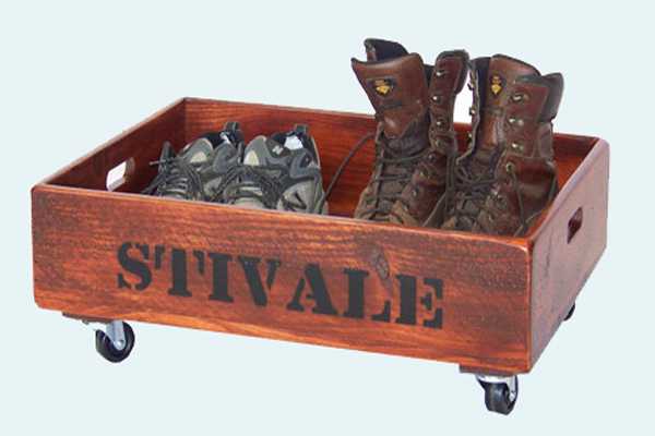 A vintage soda crate is perfect for a shoe holder in the mudroom that can roll under the bench.