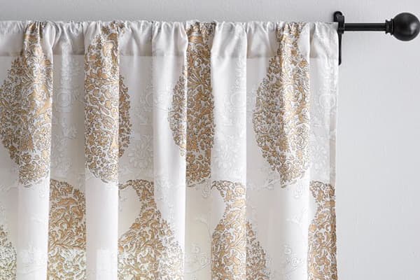 This guide will show you how to make curtains from bed sheets that are virtually identical to ones that you could buy in a retail store.