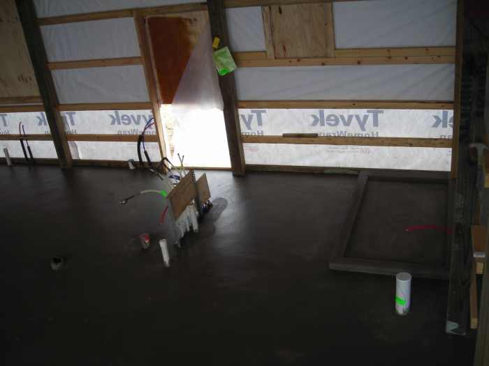 When the concrete floor was poured we had a shower basin poured and formed so we could feel the warmth of the radiant in floor heat underfoot.