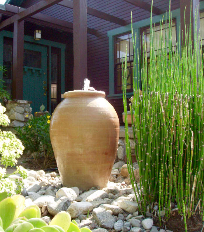 I sneaked up the driveway to take a picture of this closer, but this clever water feature looks awesome from the sidewalk. It provides a soothing trickle sound too.