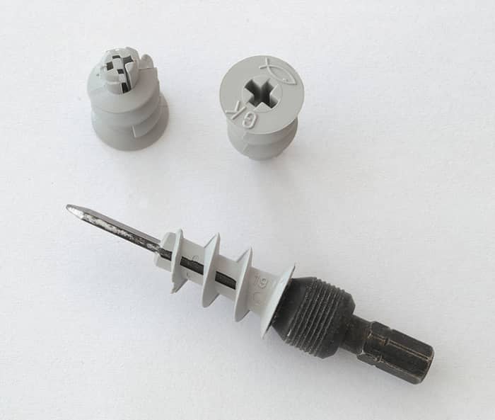 Self-drive drywall anchors and drive bit for cordless drill. Metal versions are also available. The pilot hole size which needs to be drilled in the plasterboard (6mm), is marked on the fixing