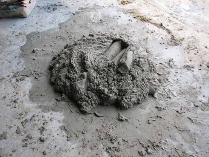 It's a good idea to mix the sand and cement before adding the water, as it's much harder to mix once the water is added.