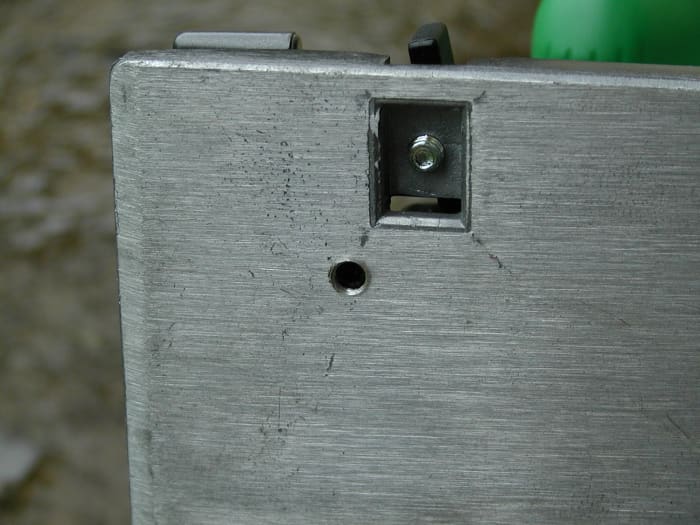Adjustment grub screw in base. This adjusts the stop to ensure 90 degree setting is square.