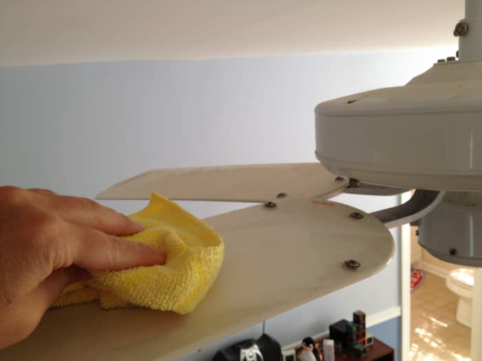 Cleaning ceiling fans: Wipe ceiling fan blades with a damp microfiber cloth.