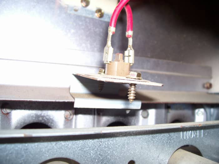One other little safety gadget is the roll-out switch. This little guy can sense if flames "roll out" of their proper domain, and shut down the system as well.