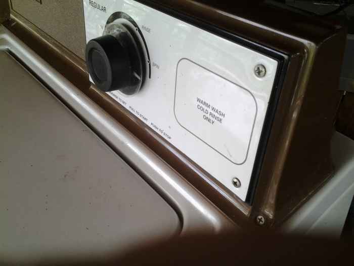 Here's what the lid switch looks like in most washing machines.