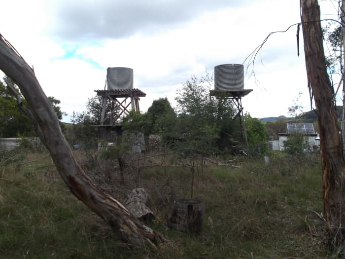 Raised water tanks like these are definitely on my wish list because they allow for effective gravity feeding with far more power than my raised tanks provide. Not much use if you live in the city though. Your neighbors are bound to complain. lol.