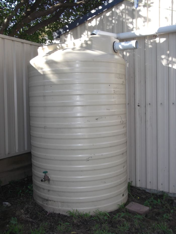 It is easy to harvest water from the roof of a garden shed. If your water tank is not on a stand or platform, remember to place your tap high enough to fit a bucket or watering can beneath it. Some water remains inaccessible - so raise your tank. :)