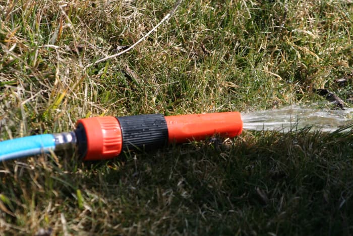 Water pressure is fine, even without a pump, as long as the water source is higher than the outlet. We now gravity feed water to gardens, plus into and onto our fire bunker in an emergency.