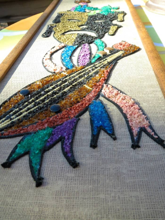 These were made from kits that came complete with gravel, and braids and string for the border edges between the bright and glassy colors, glue was included and the design already printed on a canvas board.